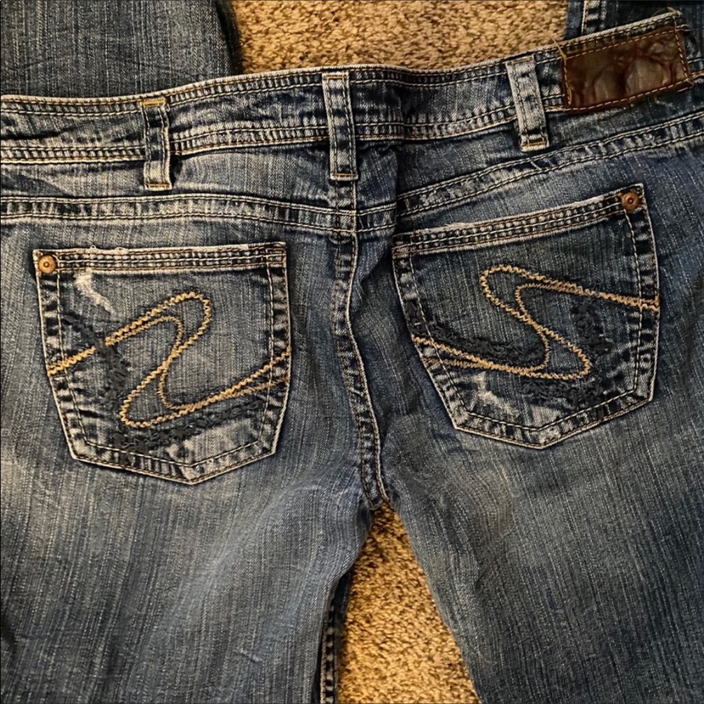 Silver distressed jeans 33